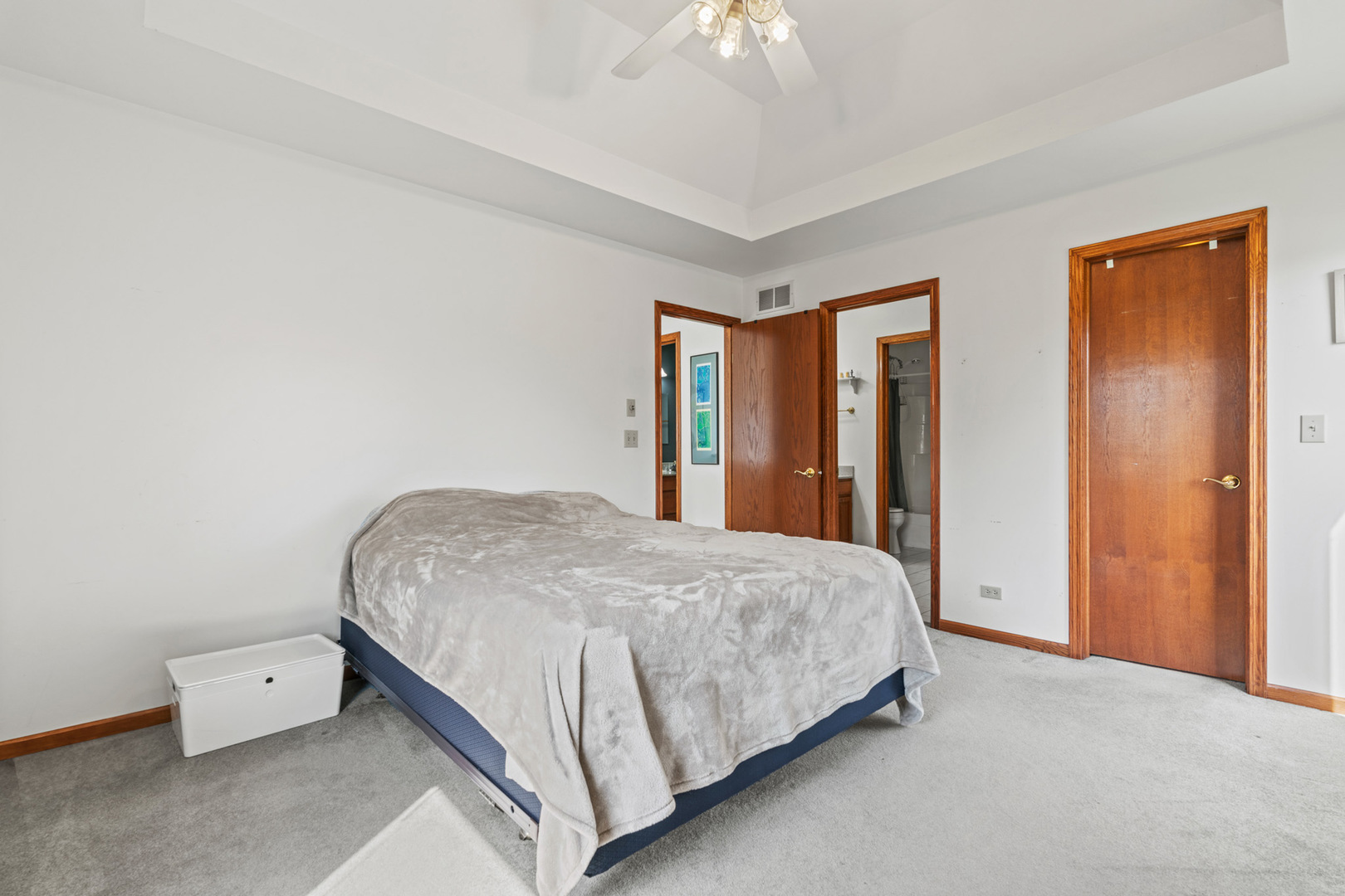 2344 Forest Avenue Rolling Meadows, IL 60008 - Photo 17 of 29 a bedroom with a bed and a chandelier