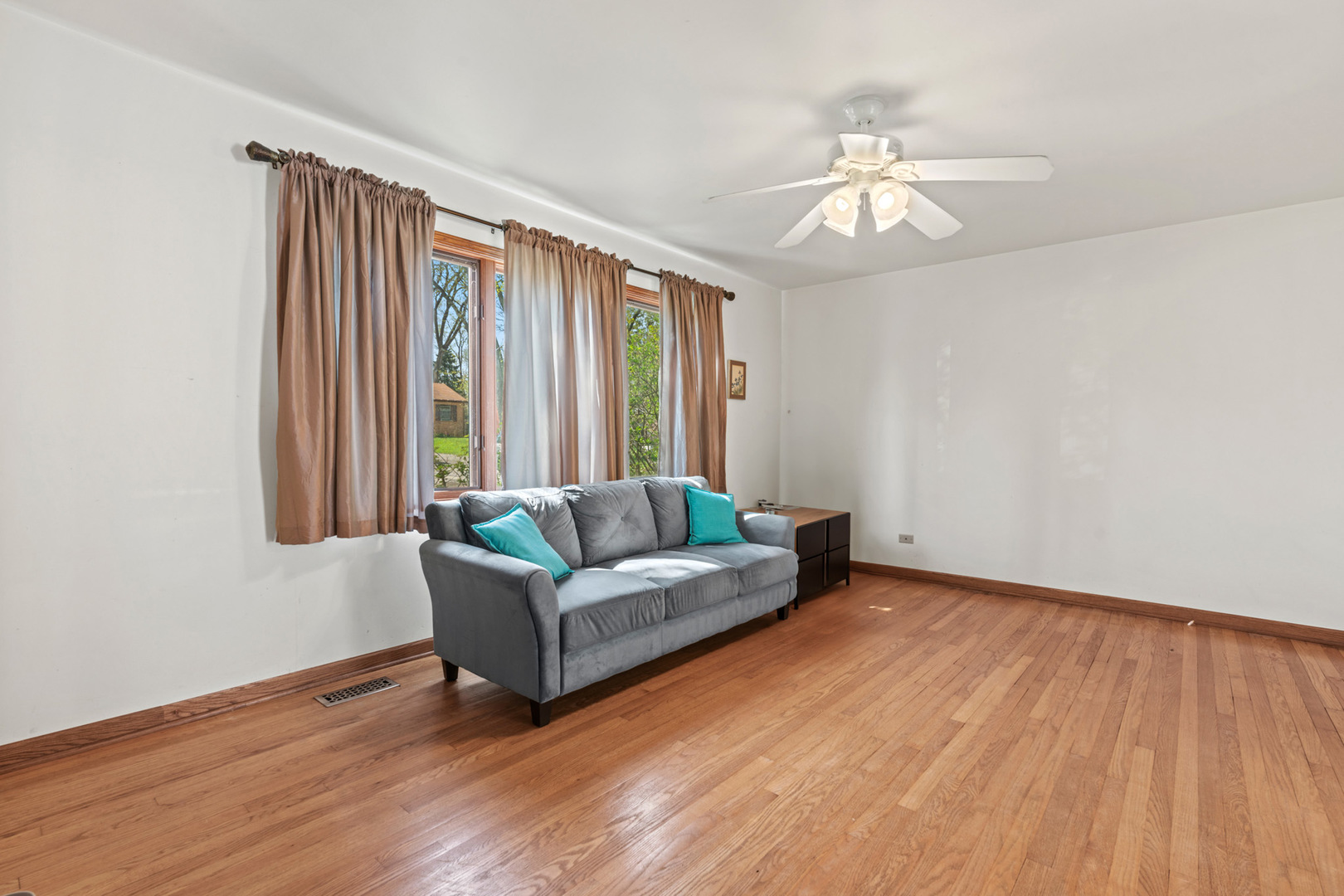 2344 Forest Avenue Rolling Meadows, IL 60008 - Photo 9 of 29 a living room with furniture and a large window
