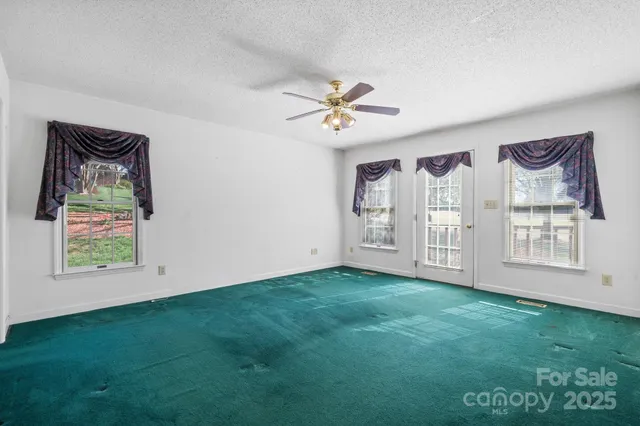 a view of room with yard