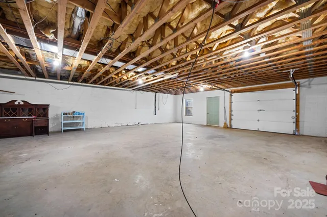 a view of balcony with wooden floor and outdoor seating