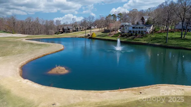 an aerial view of a house with a garden