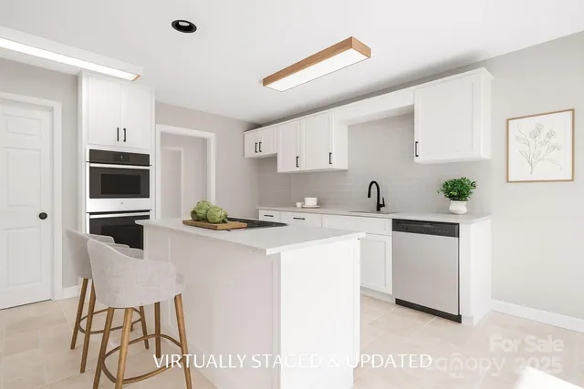 a view of a dining room with furniture wooden floor and a chandelier