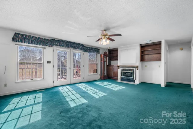 a view of a livingroom with furniture and toys