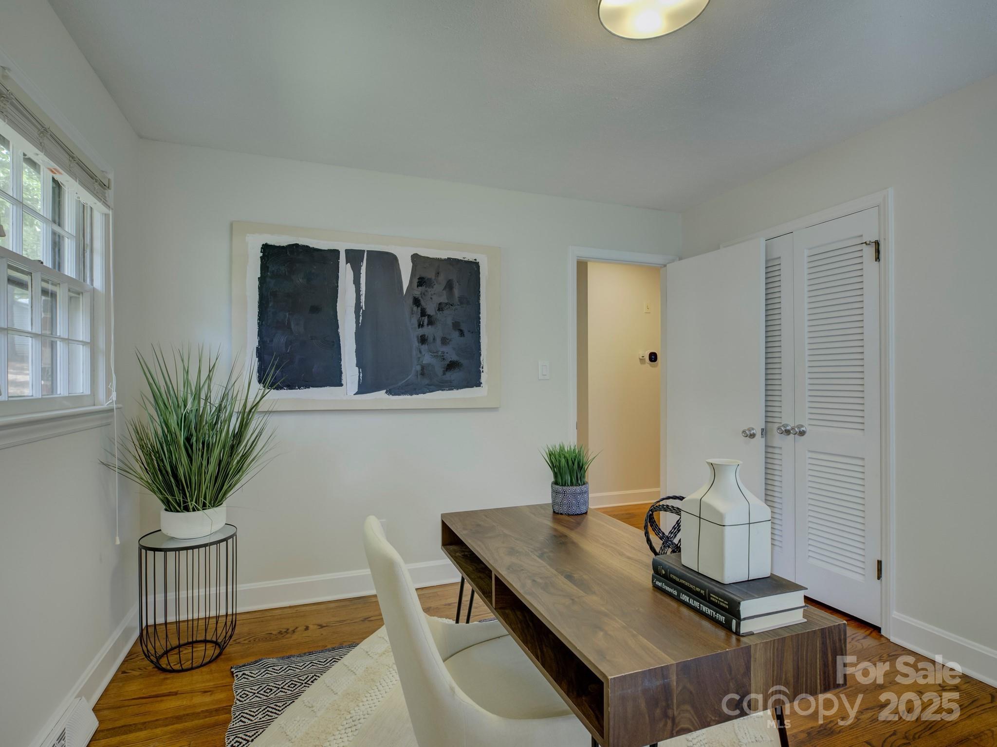 5601 Londonderry Road Charlotte, NC 28210 - Photo 24 of 42 a room with furniture and potted plant