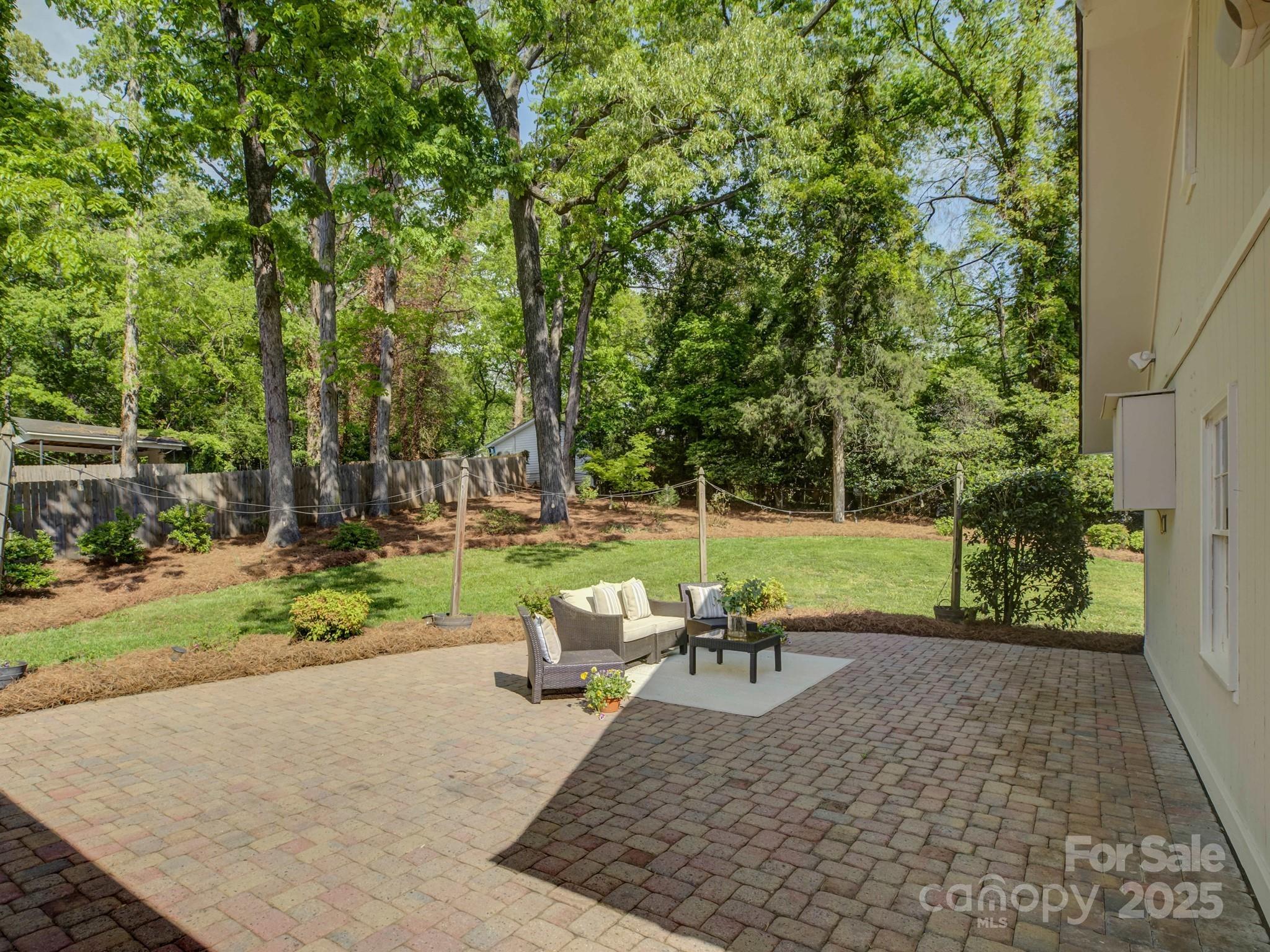 5601 Londonderry Road Charlotte, NC 28210 - Photo 32 of 42 a view of a garden with a patio