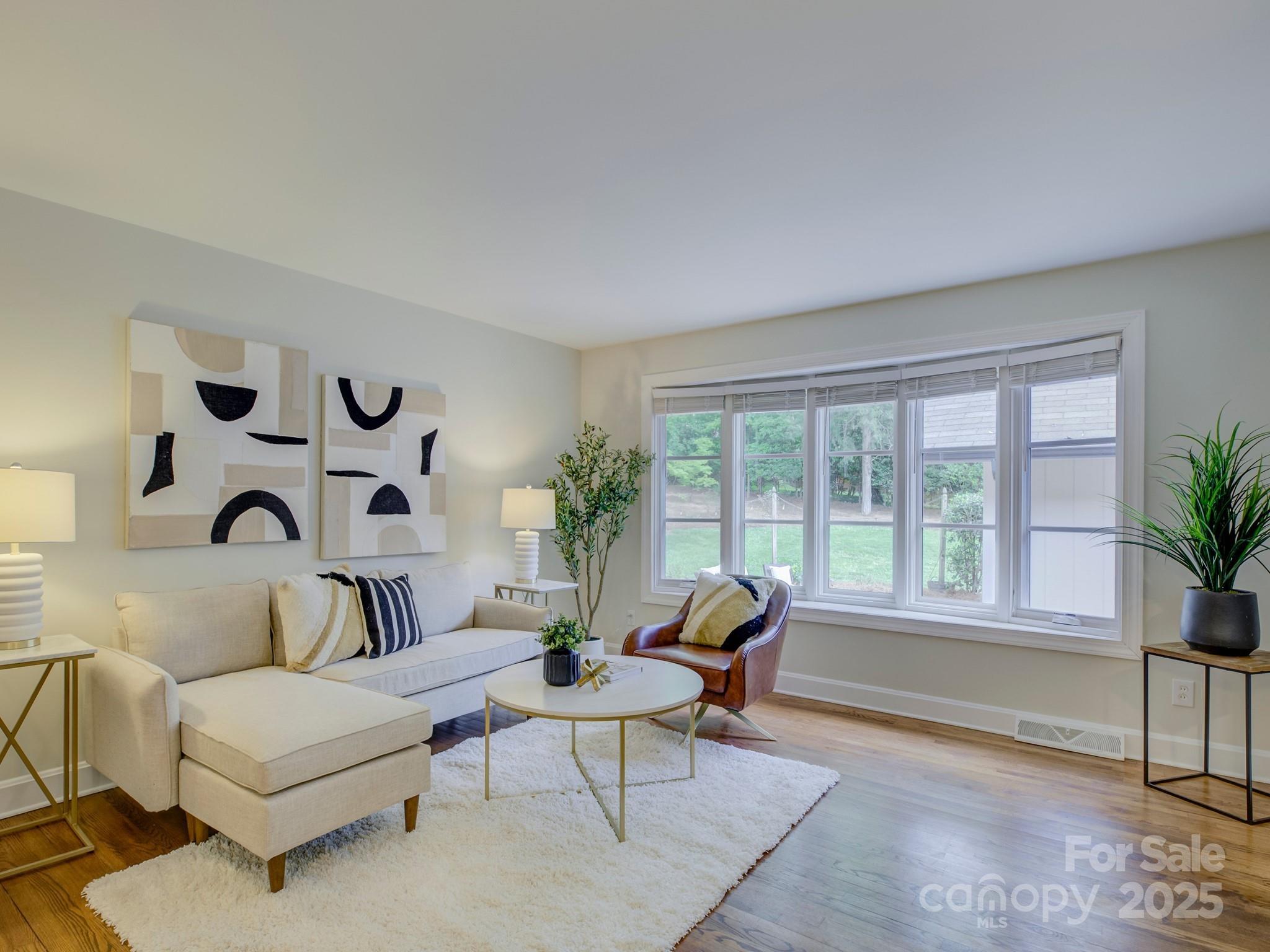 5601 Londonderry Road Charlotte, NC 28210 - Photo 4 of 42 a living room with furniture and a large window