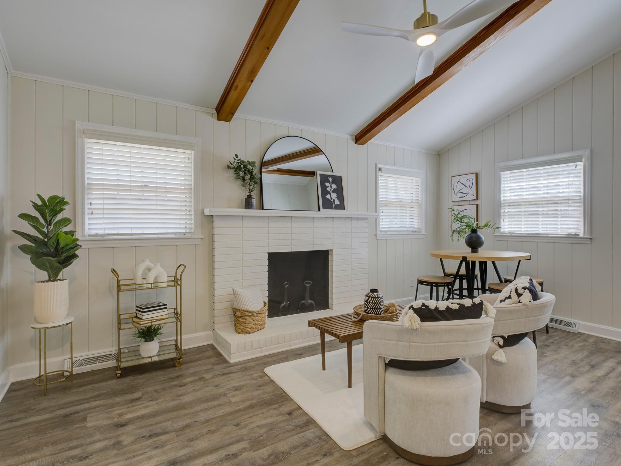 5601 Londonderry Road Charlotte, NC 28210 - Photo 10 of 42 a living room with furniture and a fireplace