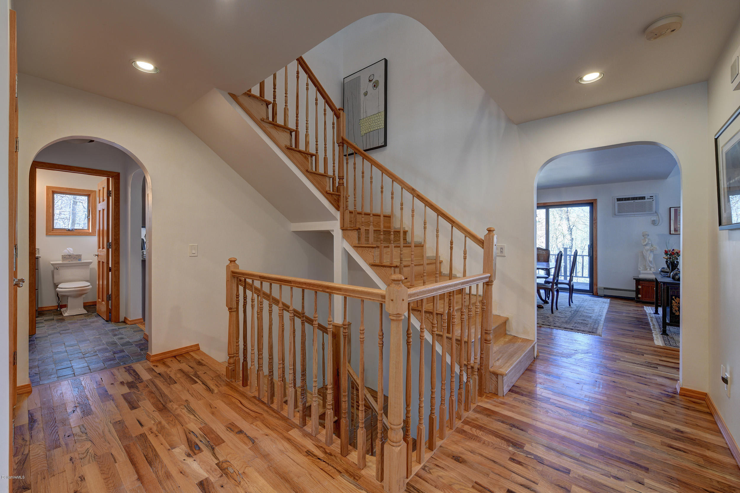 218 Whitman Road Hancock, MA 01267 - Photo 3 of 40 a view of entryway with wooden floor and stairs