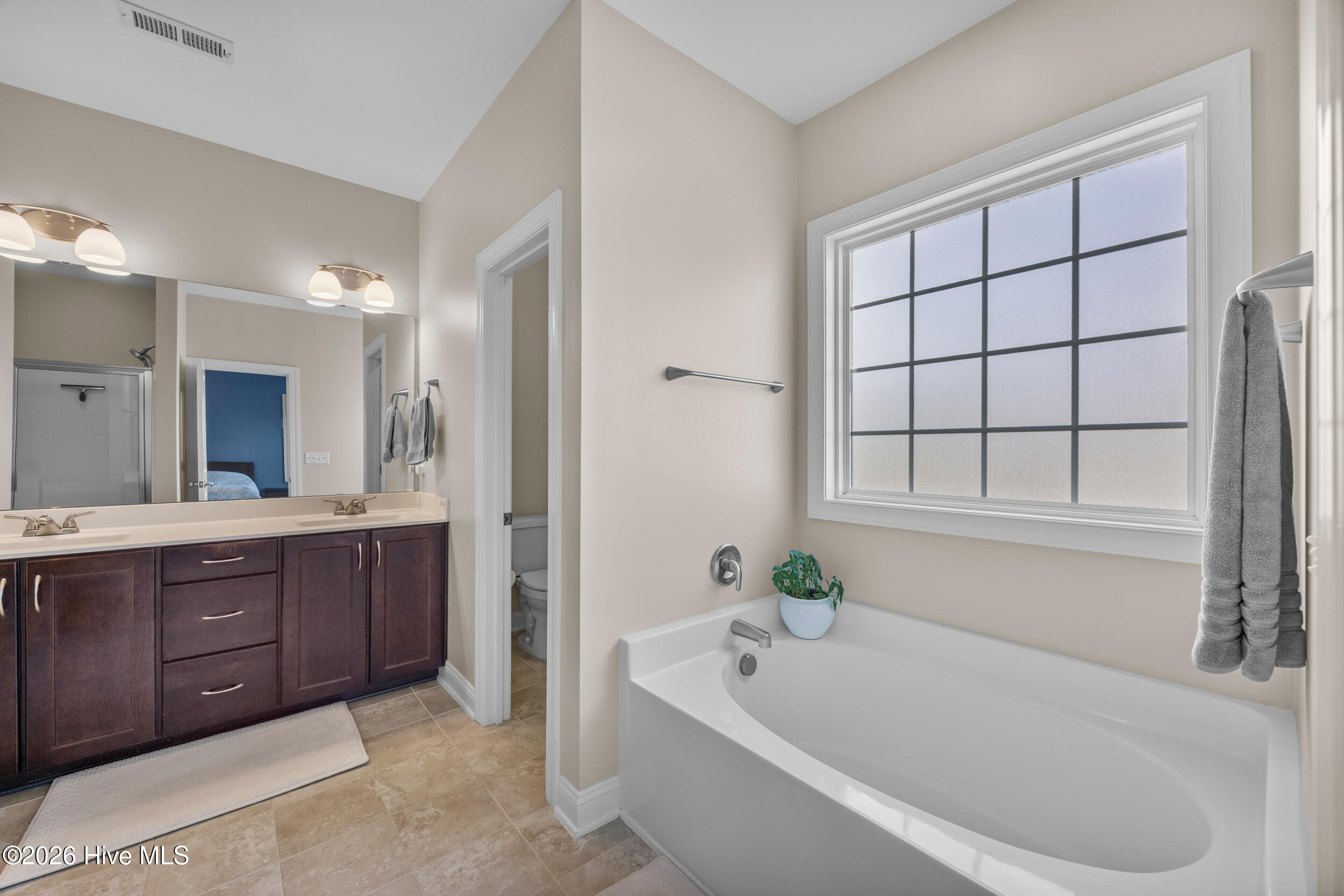 38 East Conolly Court Hampstead, NC 28443 - Photo 21 of 57 Primary Bathroom View 1