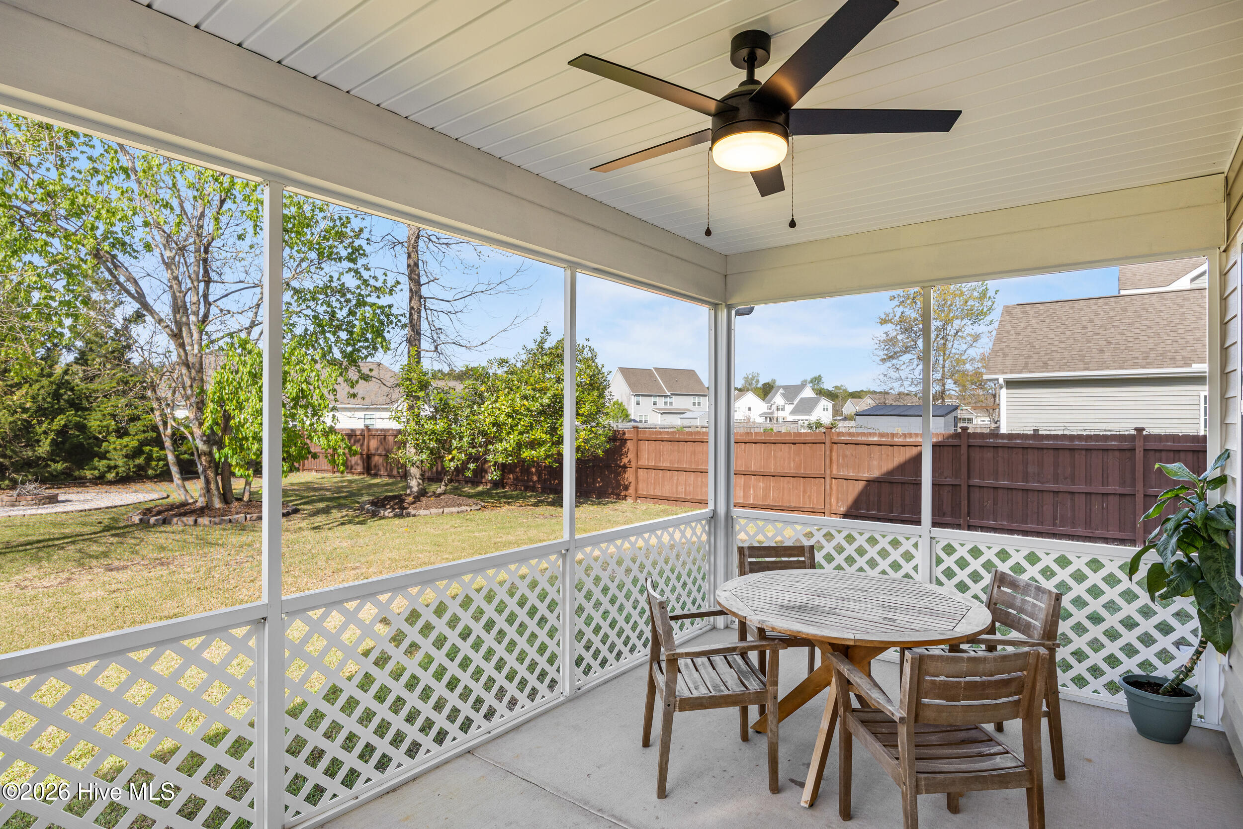 38 East Conolly Court Hampstead, NC 28443 - Photo 36 of 57 Backyard Screened in Covered Porch