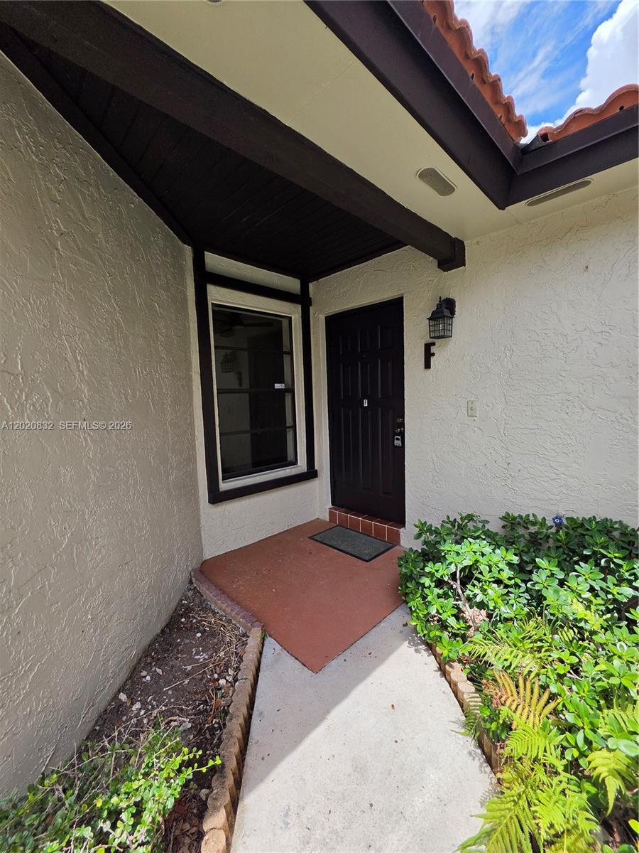 15240 Southwest 45th Terrace, Unit 54F Miami, FL 33185 - Photo 6 of 48 a view of an entrance of the house
