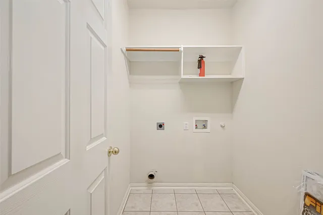 a view of storage and utility room with empty racks