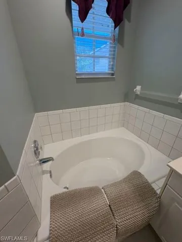 a bathroom with a shower and toilet