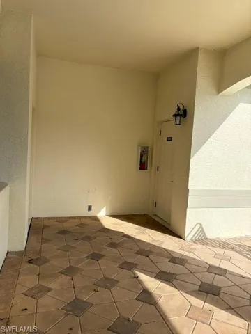 a swimming pool with outdoor seating and yard