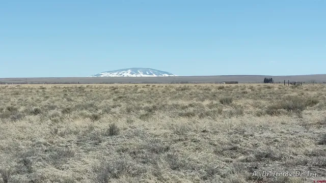 a view of mountain with sunset view