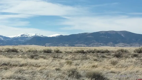 a view of an outdoor space and mountains