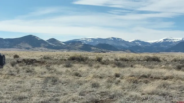 an aerial view of residential house and green space