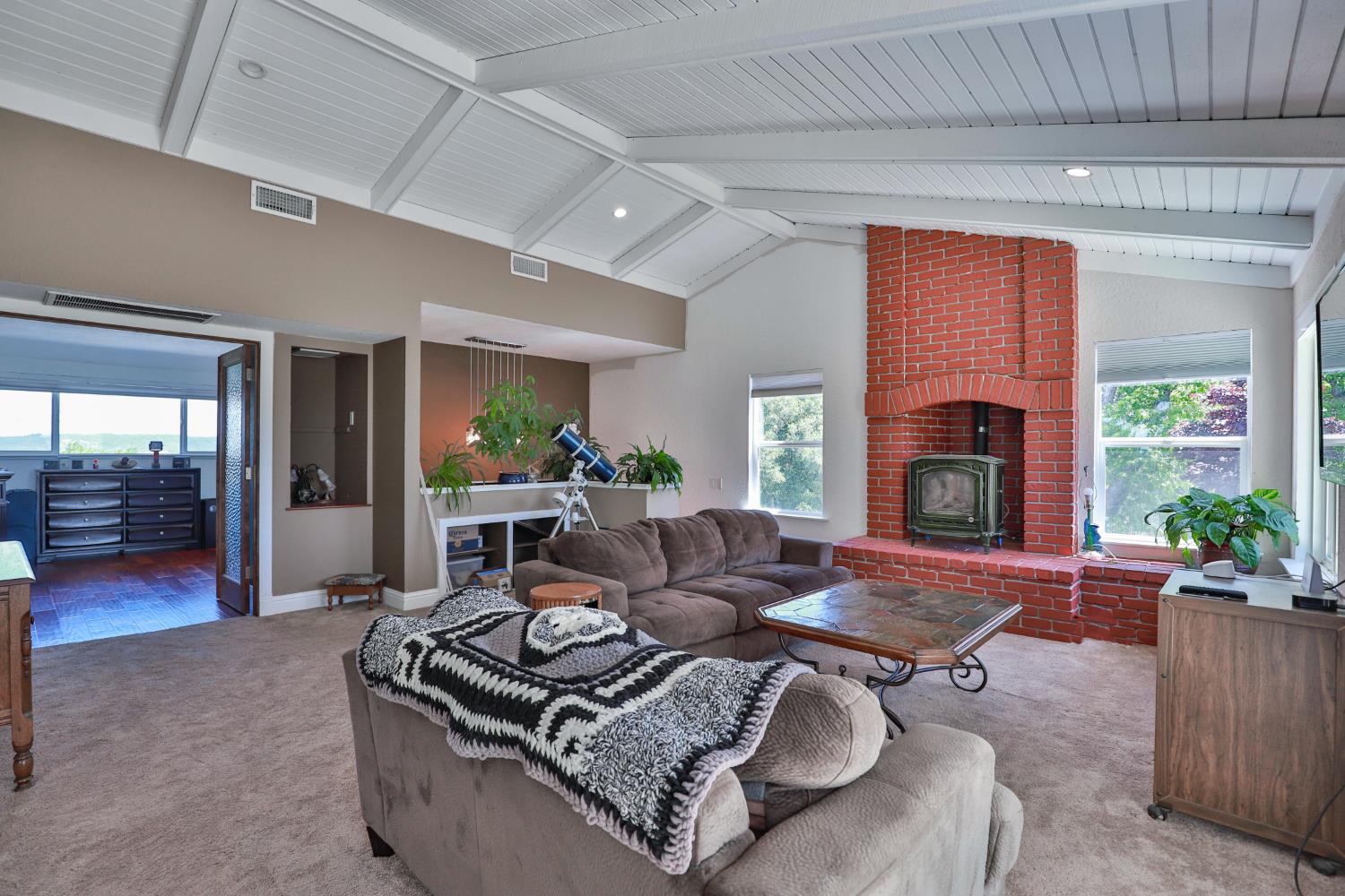 3081 Little Spur Road Somerset, CA 95684 - Photo 22 of 83 upstairs master suite LV room has brick hearth and gas stove