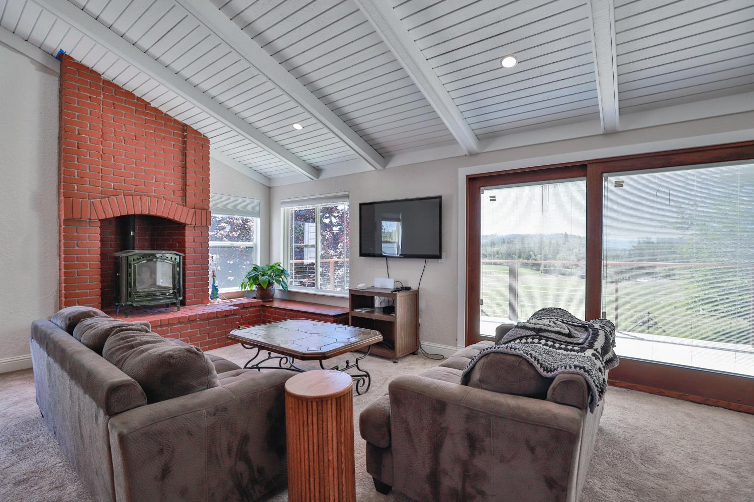 3081 Little Spur Road Somerset, CA 95684 - Photo 25 of 83 Upstairs living room has gas stove