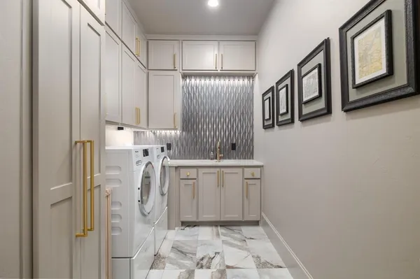 a bathroom with a sink a mirror and a shower