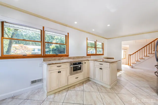 a view of an entryway with staircase