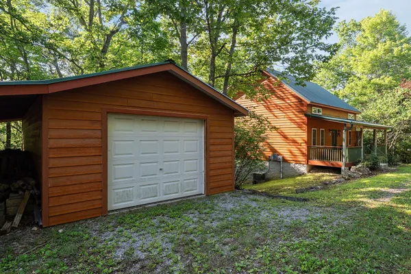 a house with trees in the background