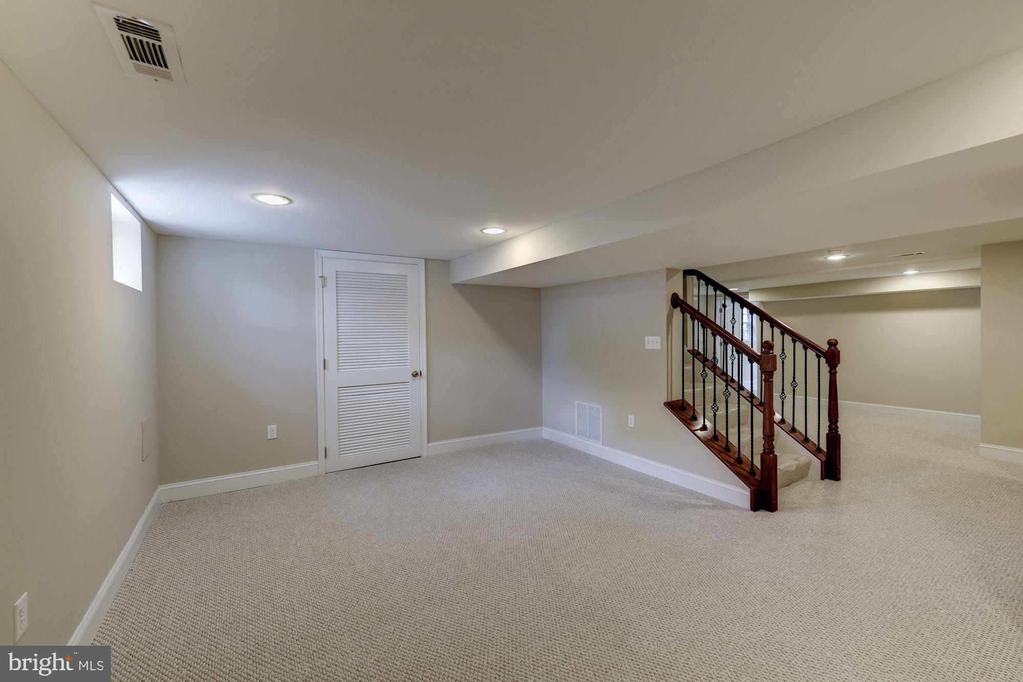 9415 Colesville Road Silver Spring, MD 20901 - Photo 24 of 34 Lower level rec room/game room