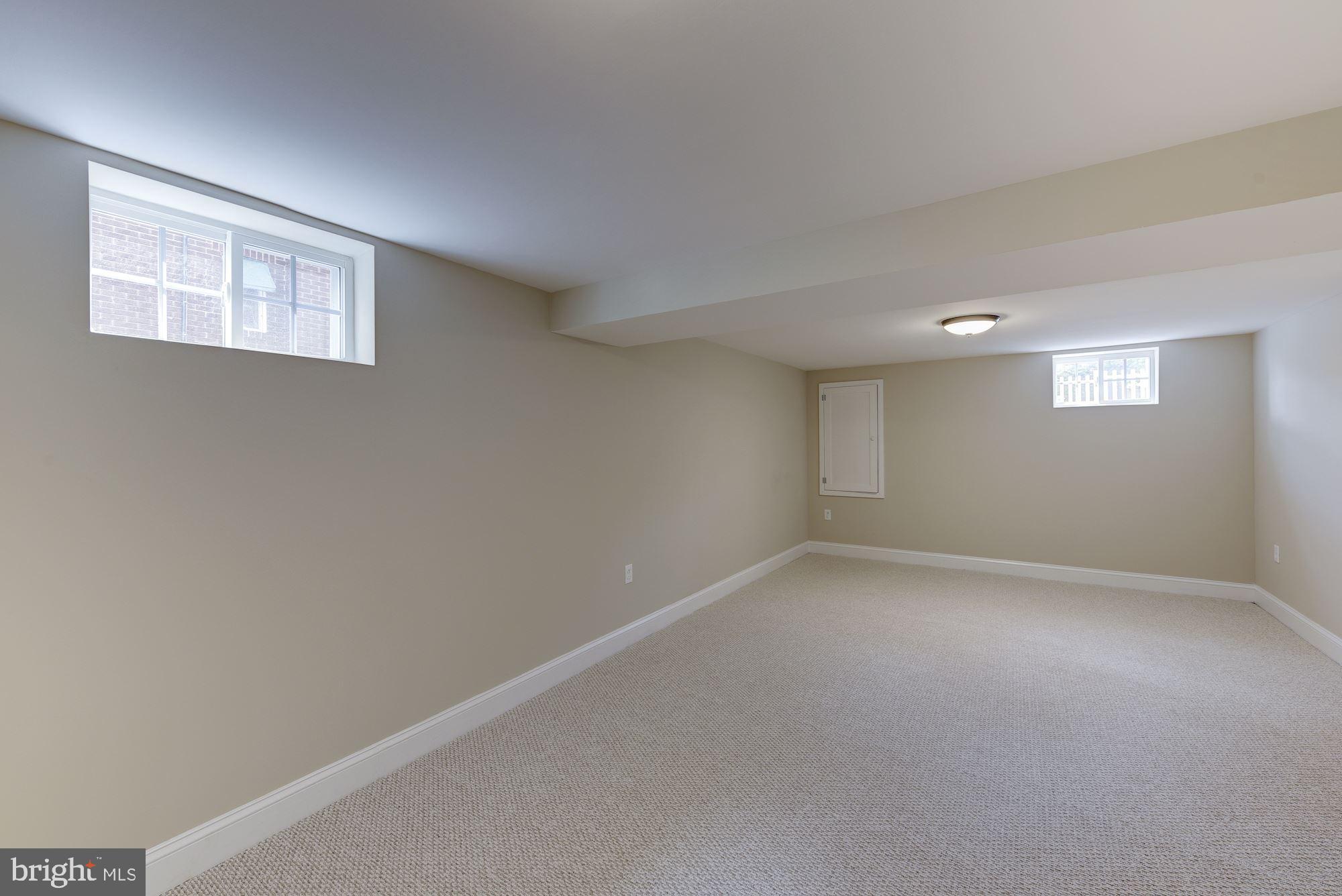 9415 Colesville Road Silver Spring, MD 20901 - Photo 25 of 34 Lower level office/media/exercise room