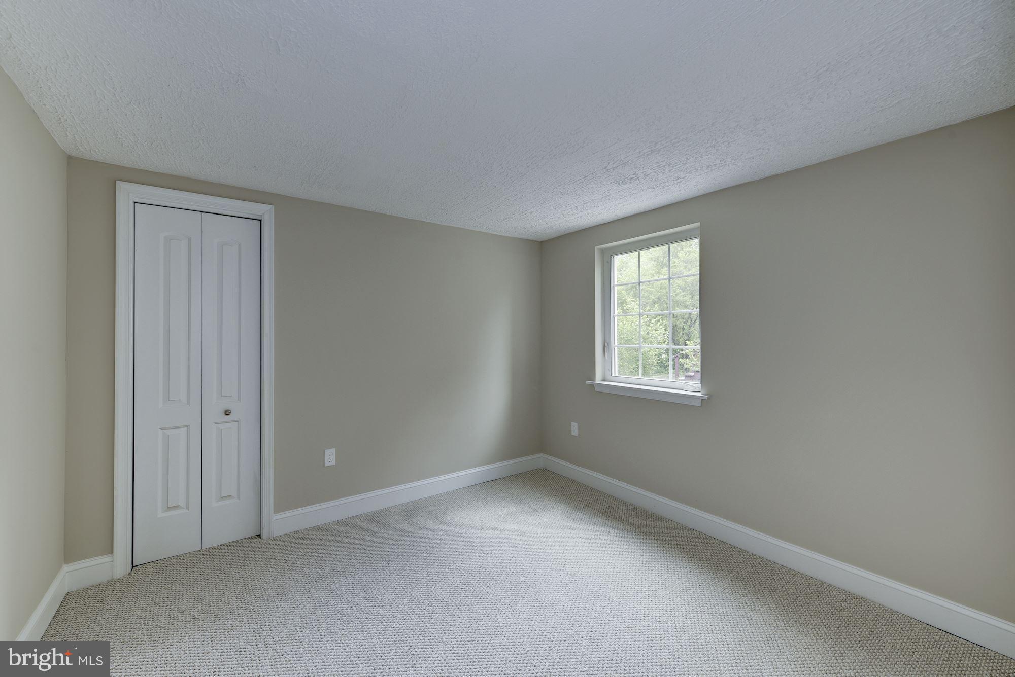 9415 Colesville Road Silver Spring, MD 20901 - Photo 28 of 34 Lower level bedroom 1
