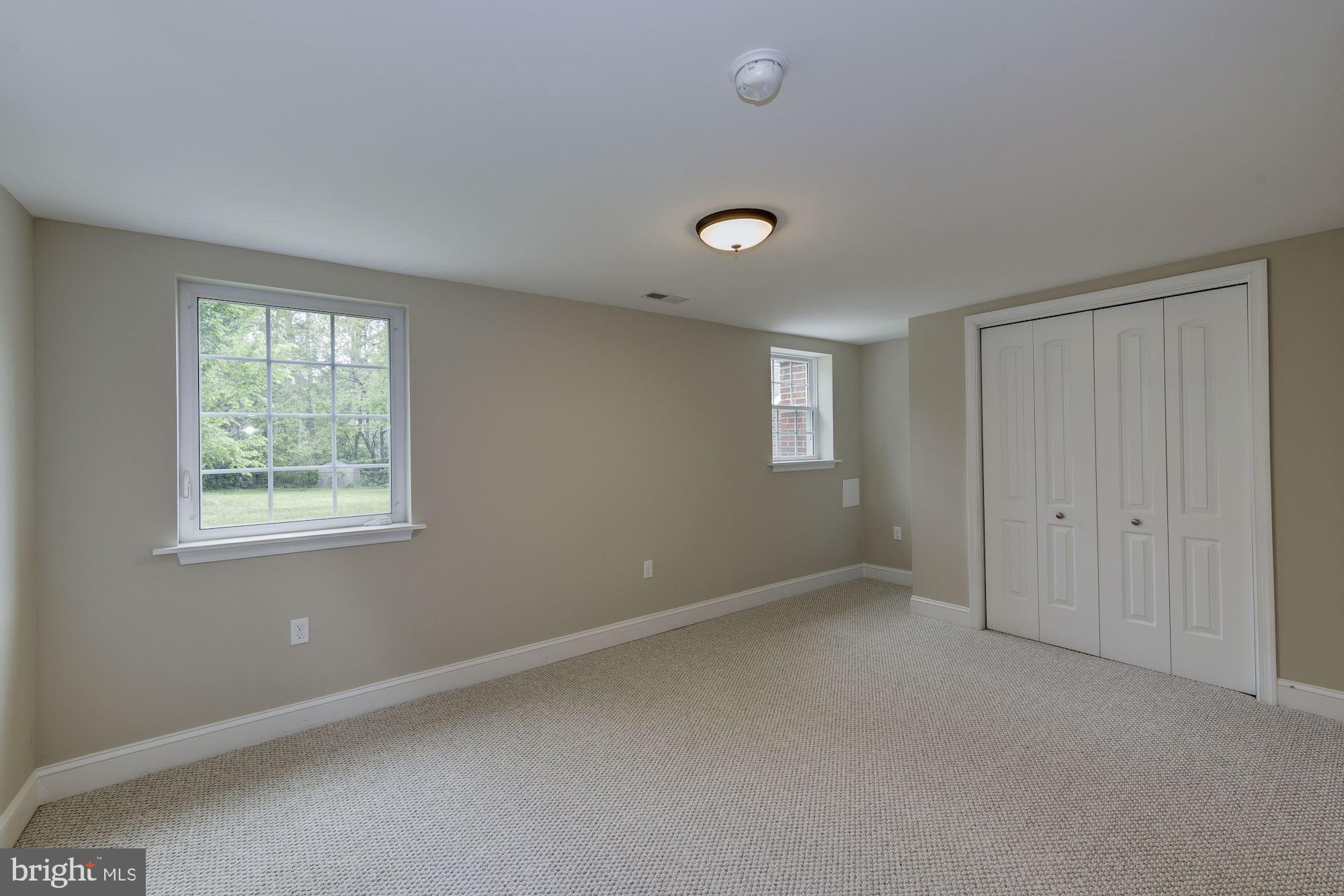 9415 Colesville Road Silver Spring, MD 20901 - Photo 29 of 34 Lower level bedroom 2