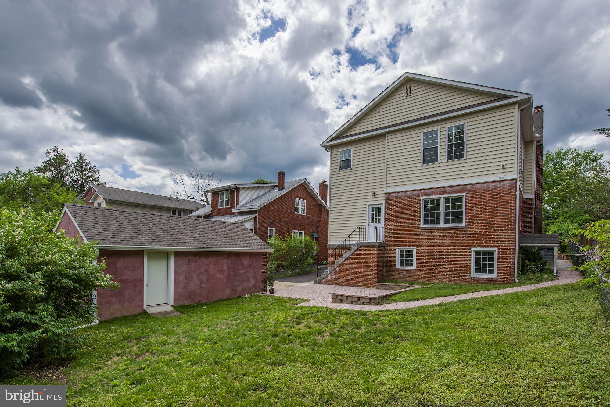 9415 Colesville Road Silver Spring, MD 20901 - Photo 32 of 34 Backyard and 1-car detached garage