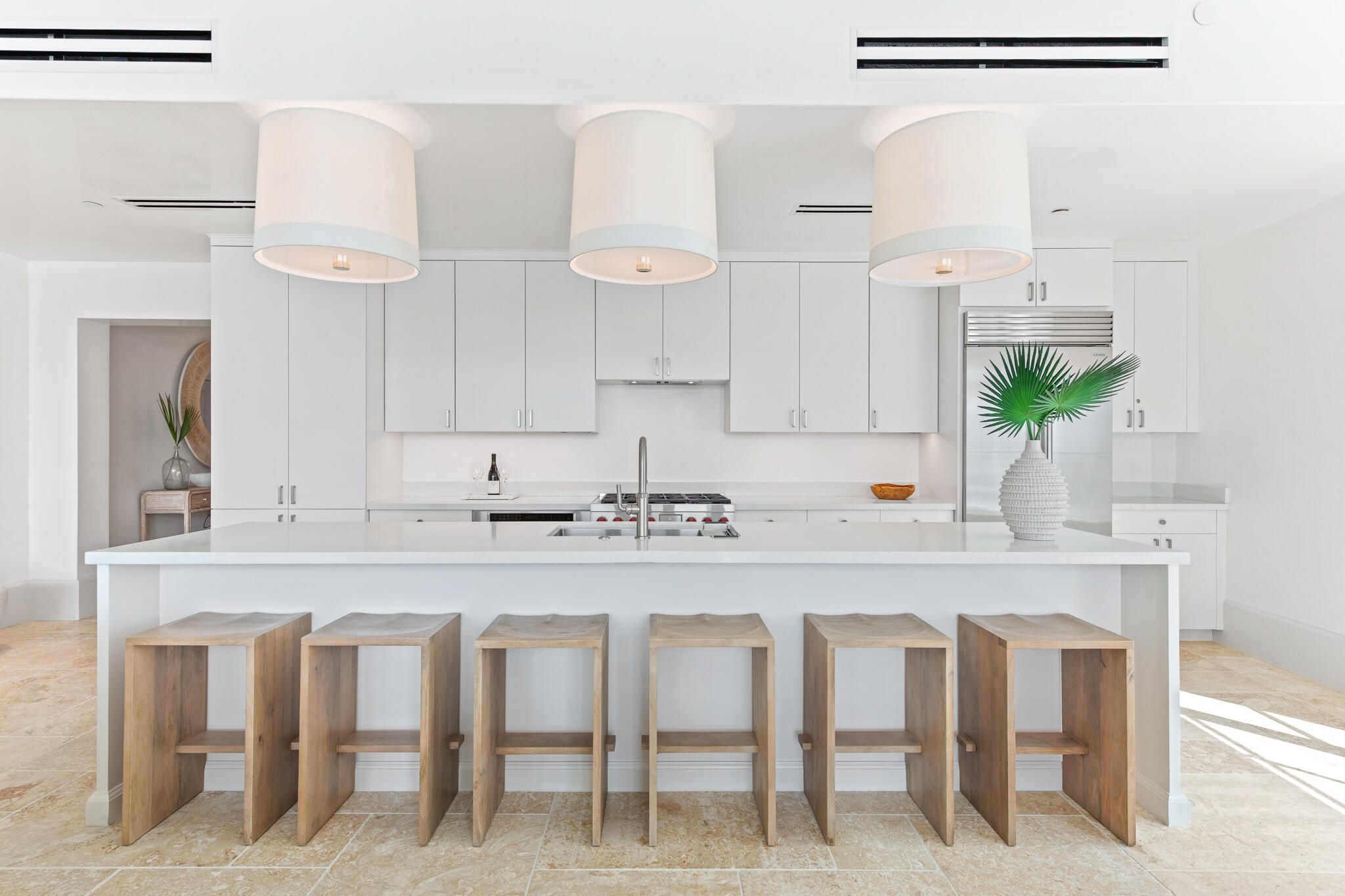 27 Admiralty Row, Unit 207 Inlet Beach, FL 32461 - Photo 18 of 37 a kitchen with granite countertop a table and chairs in it