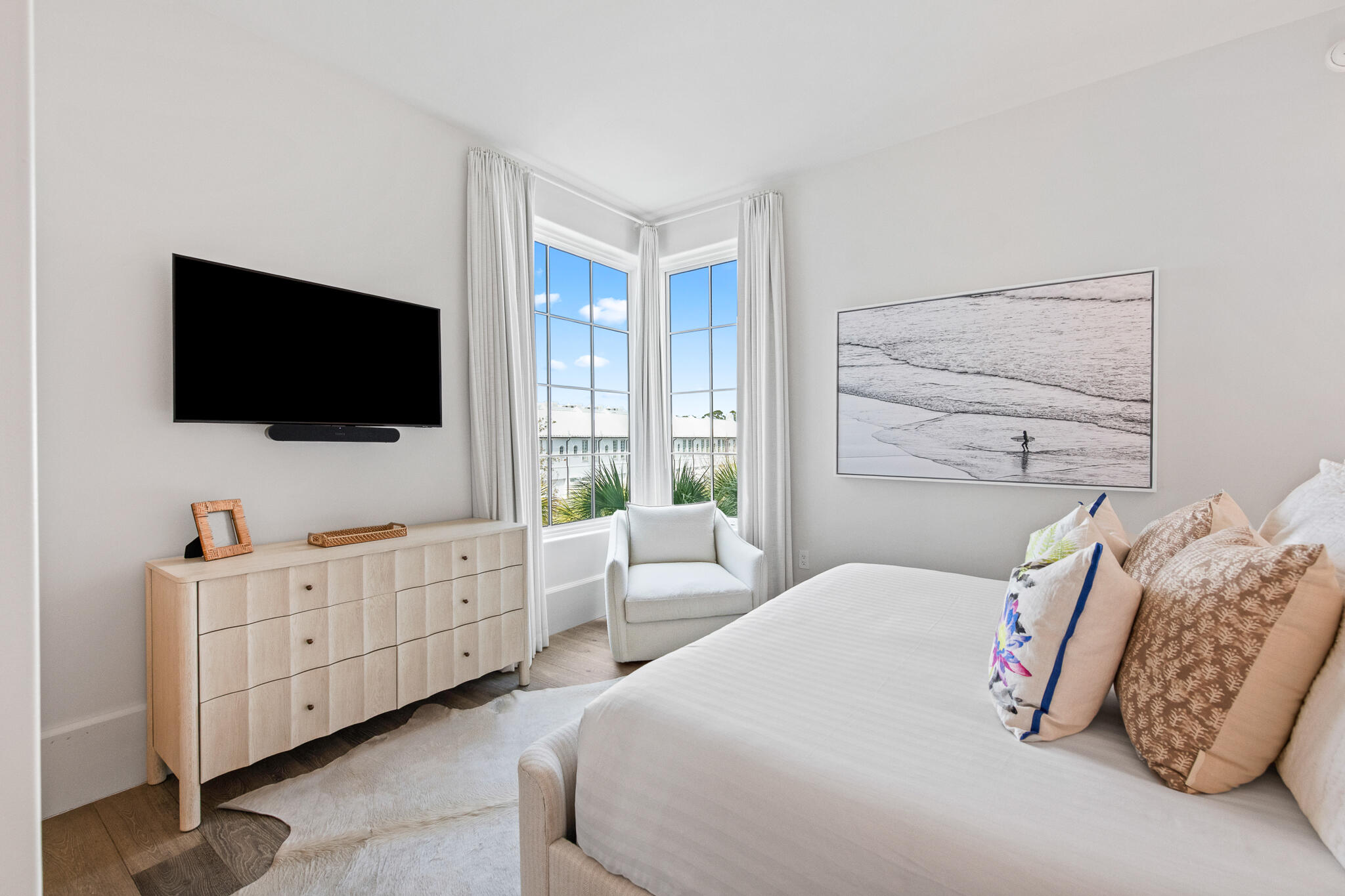 27 Admiralty Row, Unit 207 Inlet Beach, FL 32461 - Photo 25 of 37 a bedroom with furniture and flat screen tv