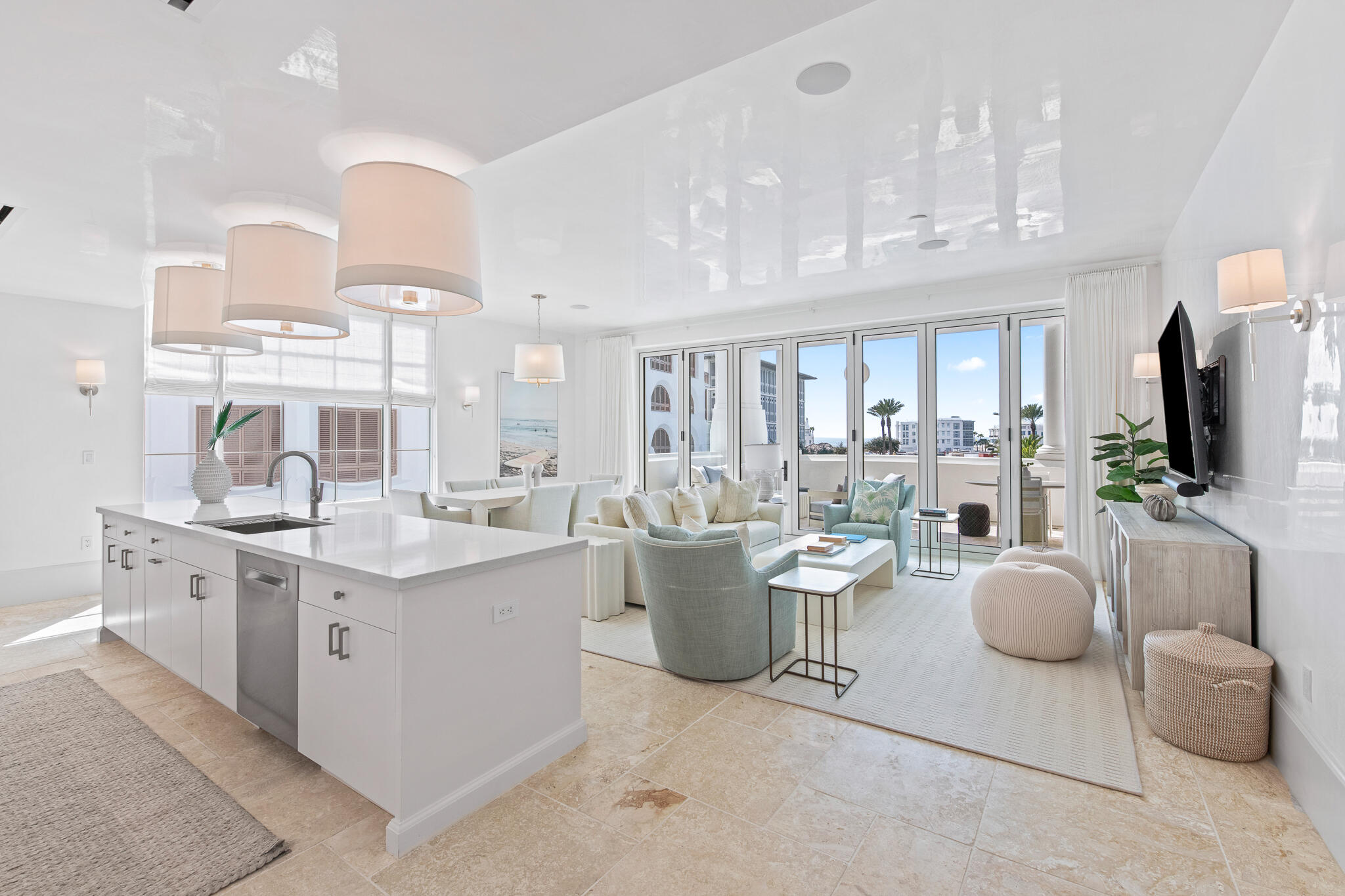 27 Admiralty Row, Unit 207 Inlet Beach, FL 32461 - Photo 6 of 37 a room with lots of white furniture and a flat screen tv