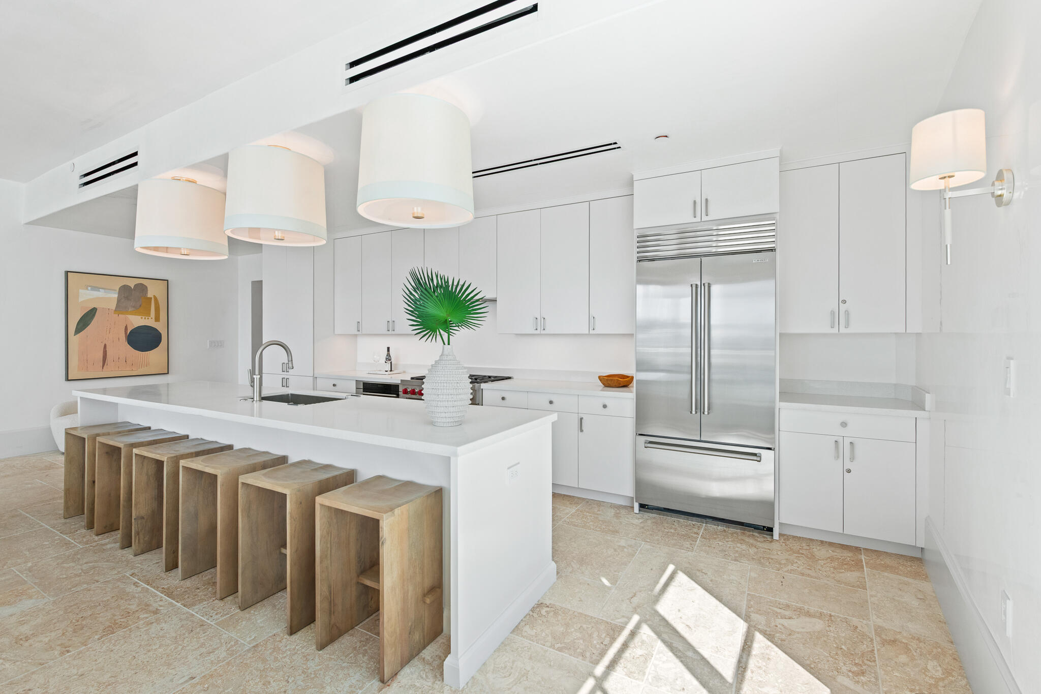 27 Admiralty Row, Unit 207 Inlet Beach, FL 32461 - Photo 7 of 37 a kitchen with white cabinets and white appliances