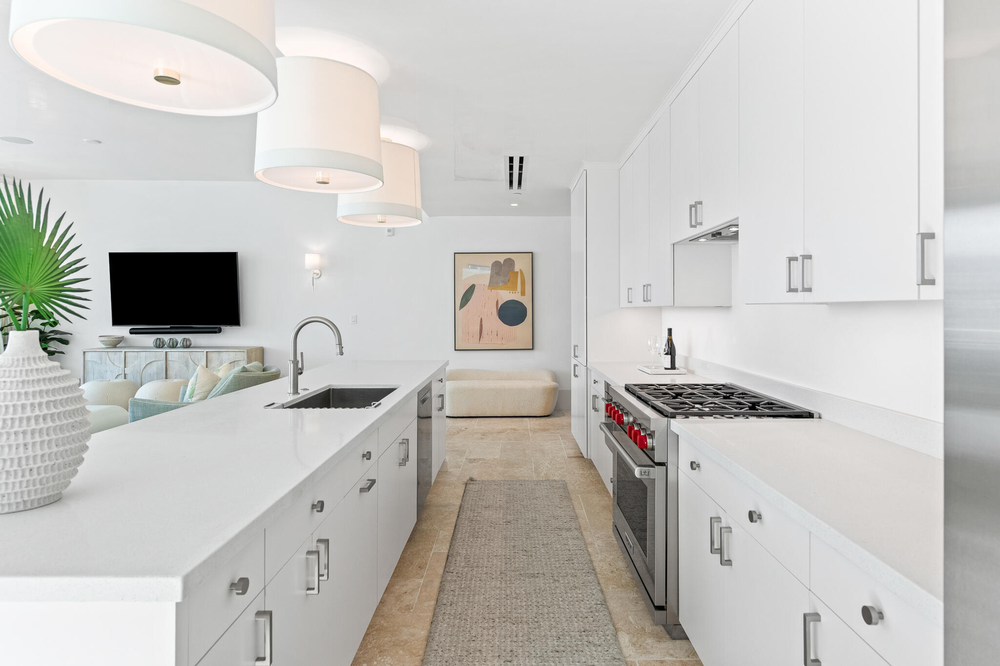 27 Admiralty Row, Unit 207 Inlet Beach, FL 32461 - Photo 8 of 37 a kitchen with stainless steel appliances a stove a sink and a microwave