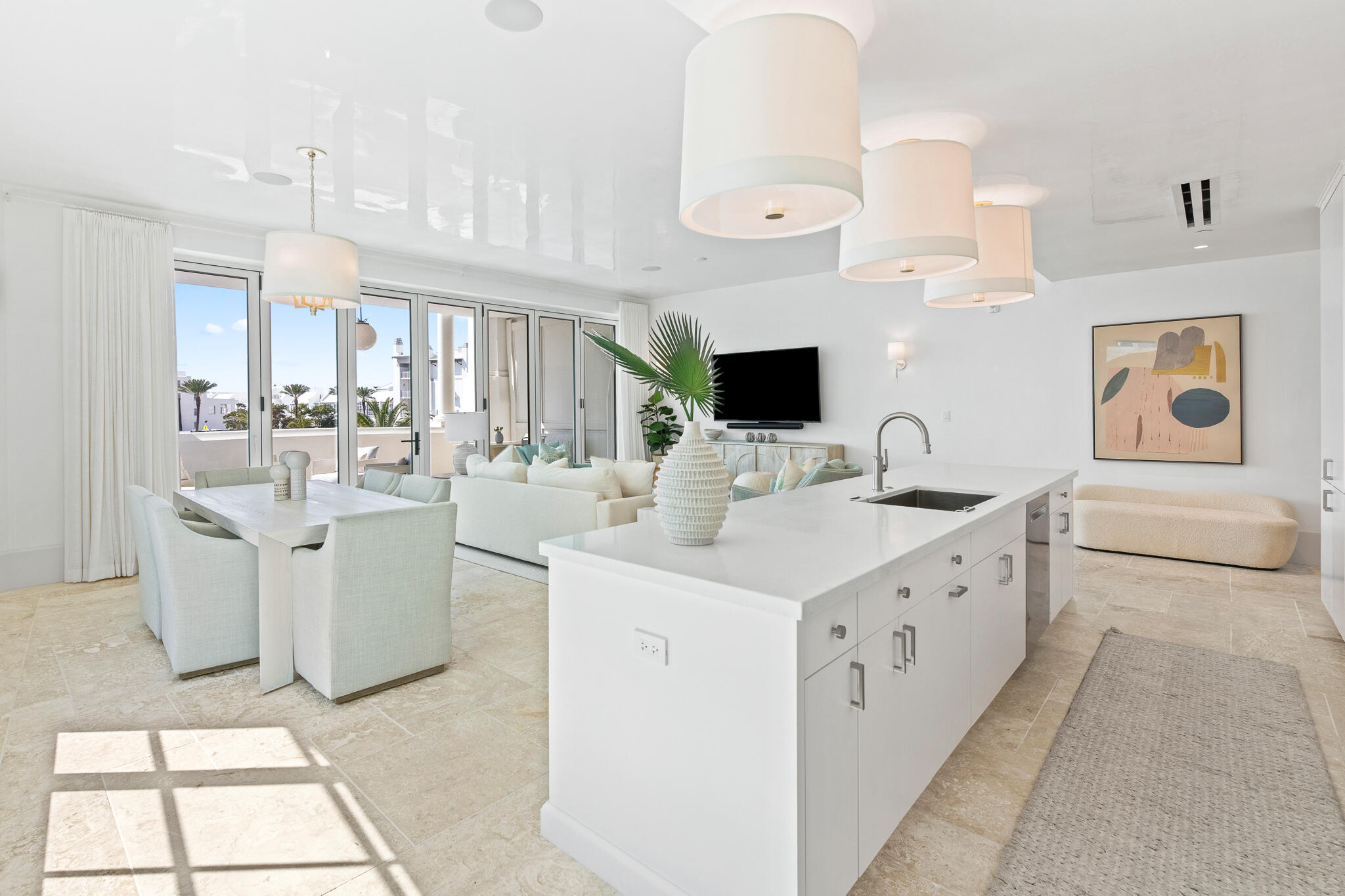 27 Admiralty Row, Unit 207 Inlet Beach, FL 32461 - Photo 9 of 37 a kitchen with cabinets a sink and appliances