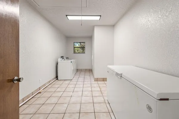 a view of a balcony with wooden floor