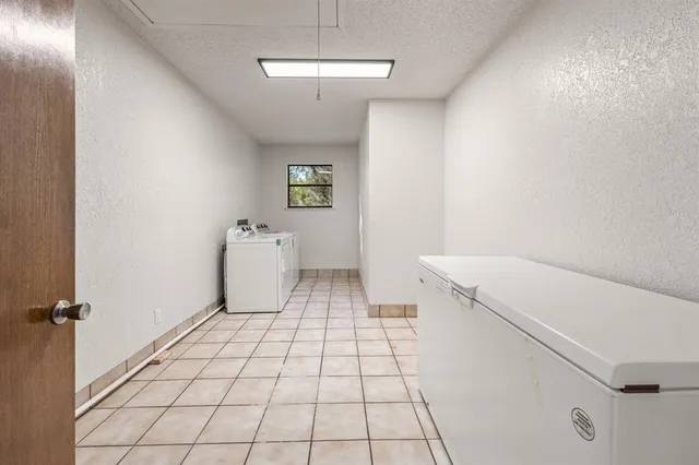 a view of a balcony with wooden floor
