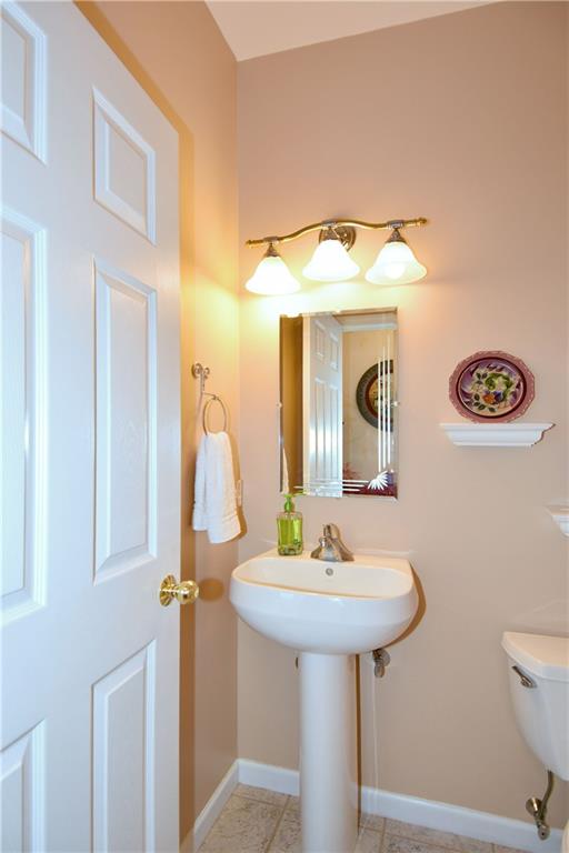 509 Tree Line Drive Gibsonia, PA 15044 - Photo 12 of 25 a bathroom with a sink and a mirror