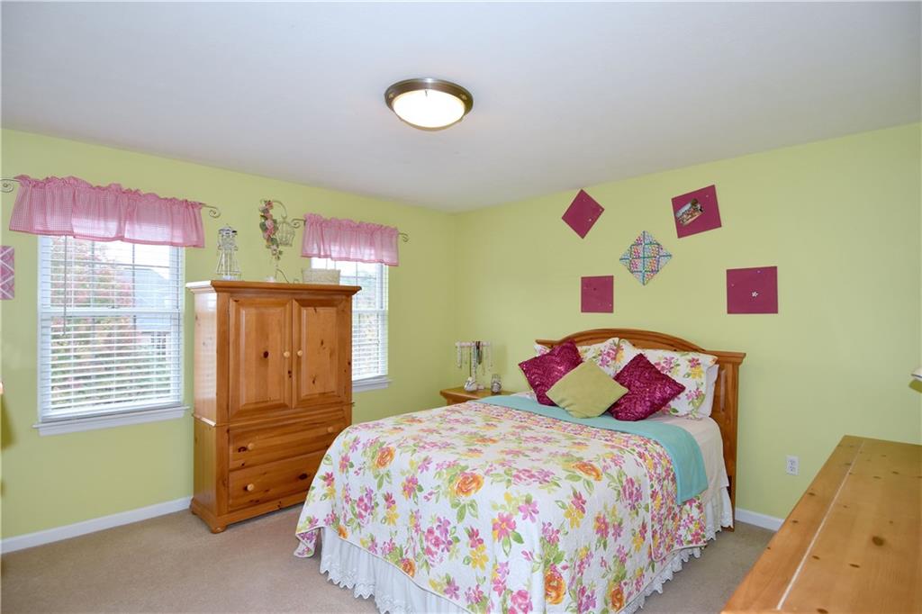 509 Tree Line Drive Gibsonia, PA 15044 - Photo 17 of 25 a bedroom with a bed and cabinets