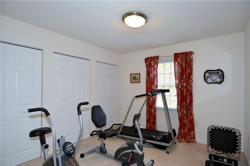 509 Tree Line Drive Gibsonia, PA 15044 - Photo 19 of 25 a view of a room with gym equipment