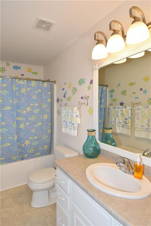 509 Tree Line Drive Gibsonia, PA 15044 - Photo 20 of 25 a bathroom with a granite countertop sink a toilet and shower