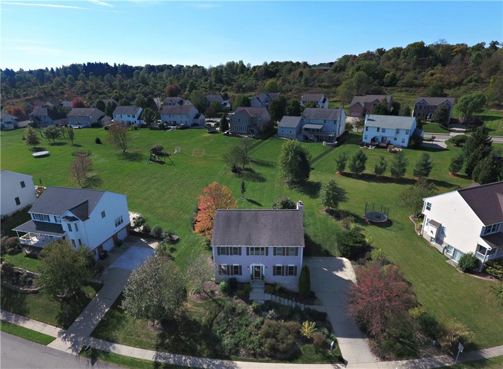 509 Tree Line Drive Gibsonia, PA 15044 - Photo 2 of 25 an aerial view of a house with mountain view