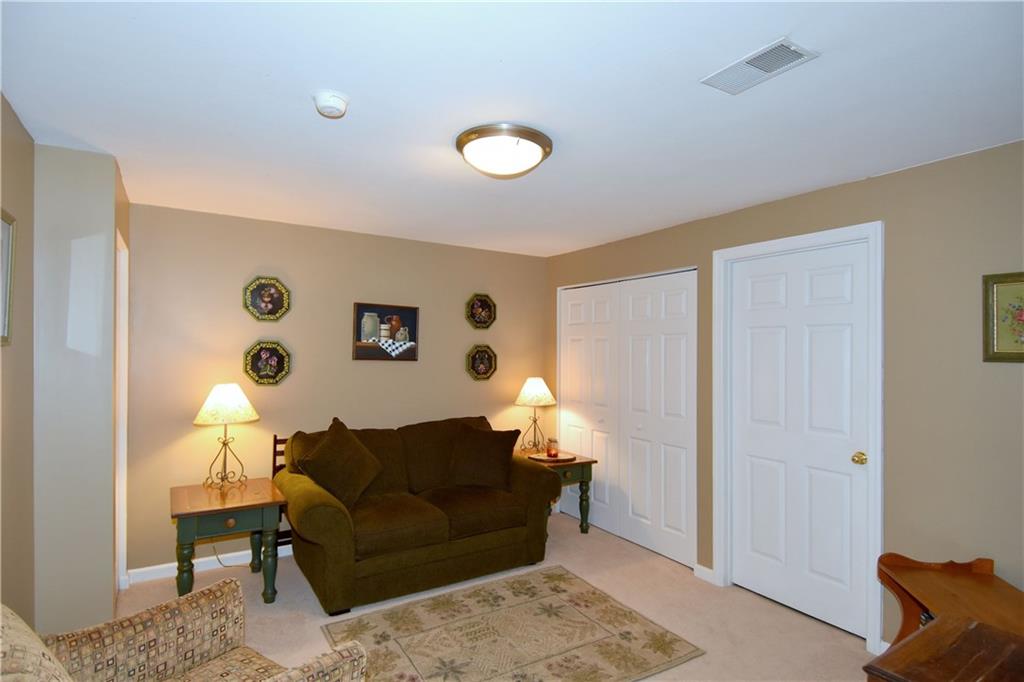 509 Tree Line Drive Gibsonia, PA 15044 - Photo 21 of 25 a living room with furniture and a window