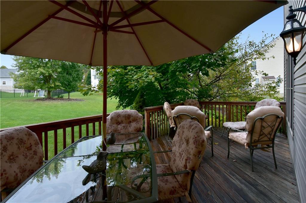 509 Tree Line Drive Gibsonia, PA 15044 - Photo 22 of 25 a view of a two chairs and table in the deck