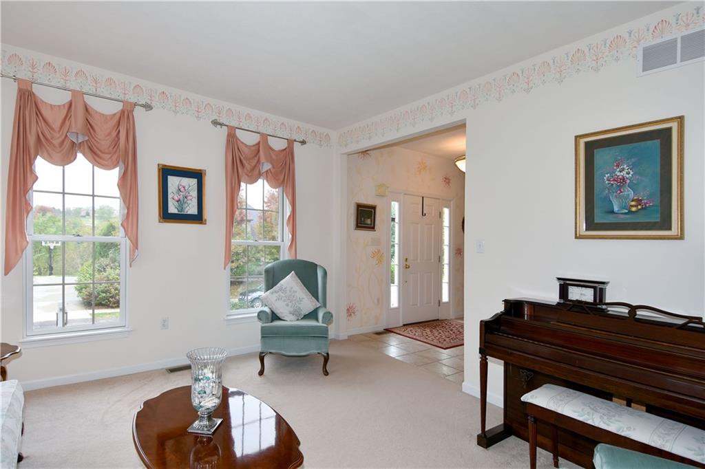 509 Tree Line Drive Gibsonia, PA 15044 - Photo 3 of 25 a living room with furniture and a window