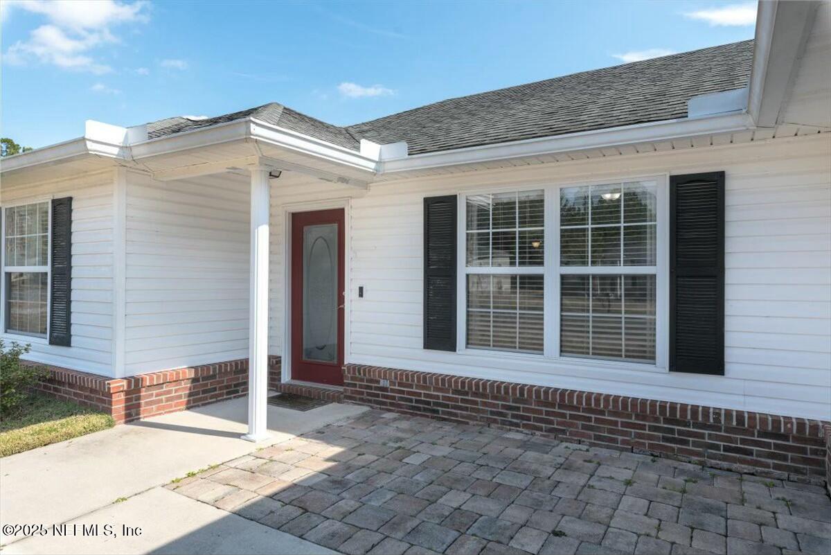 930 Red Fox Way Macclenny, FL 32063 - Photo 3 of 43 a view of a house with a yard