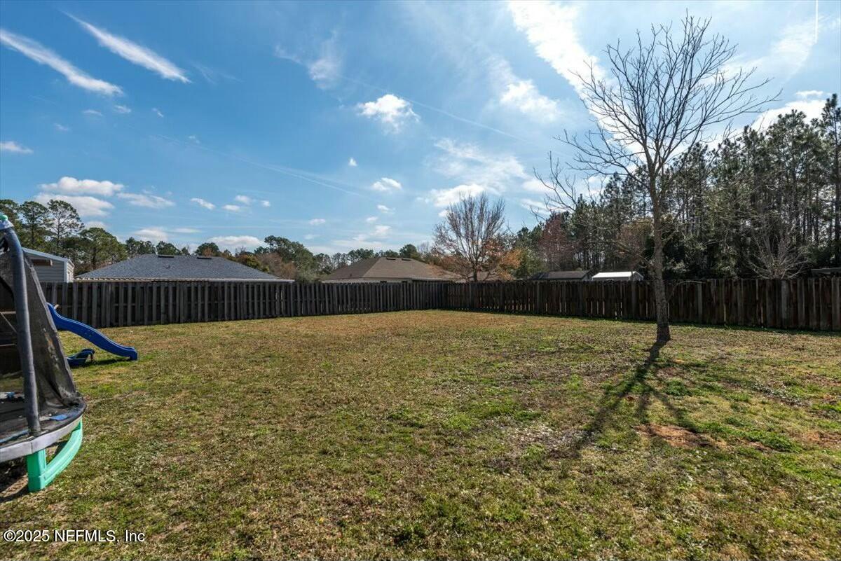 930 Red Fox Way Macclenny, FL 32063 - Photo 34 of 43 a backyard of a house