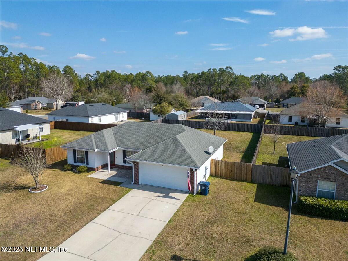 930 Red Fox Way Macclenny, FL 32063 - Photo 37 of 43 a view of a patio with swimming pool